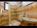 Appartamenti Gogi - 130 m from sea: SA2(2), A1(2) Postira - Isola di Brac  - Appartamento - A1(2): il bagno con la toilette