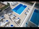 Appartamenti Ivan - with heated pool and seaview: A1(4), B1(4) Postira - Isola di Brac  - la piscina