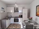 Appartamenti Dioniza - 150 m from beach: A1(2+2), A2(3), A3(2+2) Jelsa - Isola di Hvar  - Appartamento - A1(2+2): la cucina con la sala da pranzo