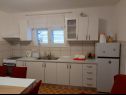 Appartamenti Bila - 15m from the sea: A1(6) Tisno - Isola di Murter  - Appartamento - A1(6): la cucina con la sala da pranzo