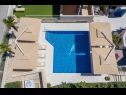 Appartamenti Luka - with pool: A2(2+2) Novalja - Isola di Pag  - la casa