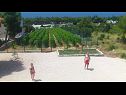 Appartamenti Dia - 200 m from beach: A1 donji (6), A2 gornji(4+2) Primosten - Riviera Sibenik  - il cortile