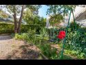 Appartamenti Vini- beautiful garden and terrase A4(4+2) Podstrana - Riviera Split  - il cortile