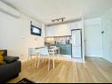 Appartamenti Mendula - private garage: A1(2+2), A2(2+2) Split - Riviera Split  - Appartamento - A1(2+2): la cucina con la sala da pranzo