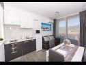 Appartamenti Ivica - 100m from the sea A1(2+2), A2(2+2), A3(2+2), A4(2+2), A5(3+2) Drvenik Veli (Isola di Drvenik Veli) - Riviera Trogir  - Appartamento - A2(2+2): la cucina con la sala da pranzo