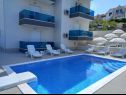 Appartamenti Ivan - with heated pool and seaview: A1(4), B1(4) Postira - Isola di Brac  - la piscina (casa e dintorni)