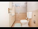 Appartamenti Žana - close to beach: A1(5+1) Veliki, A2(3) Mali Arbanija - Isola di Ciovo  - Appartamento - A1(5+1) Veliki: il bagno con la toilette