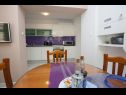 Appartamenti Palmina - comfort apartment: A1 veliki (6),  A2 žuti (4+1), A3 lila (2), SA4 bijeli (2) Makarska - Riviera Makarska  - Appartamento - A1 veliki (6): la cucina con la sala da pranzo