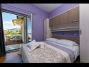 Appartamenti Palmina - comfort apartment: A1 veliki (6),  A2 žuti (4+1), A3 lila (2), SA4 bijeli (2) Makarska - Riviera Makarska  - Appartamento -  A2 žuti (4+1): la camera da letto