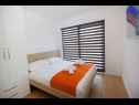 Appartamenti Maka - city centar: A1(4+2), A2(2+2), A3(4+2), A4(2+2), A5(4+2), A6(4+1) Makarska - Riviera Makarska  - Appartamento - A1(4+2): la camera da letto