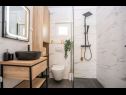 Appartamenti Bruno - modern apartment with pool: A1(4+2) Ostrvica - Riviera Omis  - Appartamento - A1(4+2): il bagno con la toilette