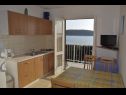 Appartamenti Petar - 6m from the sea: A1(4), A3(2) Barbat - Isola di Rab  - Appartamento - A1(4): la cucina con la sala da pranzo