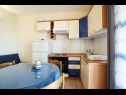 Appartamenti Lasan - 150 m from sea: A1(4), A2(4) Vodice - Riviera Sibenik  - Appartamento - A1(4): la cucina con la sala da pranzo