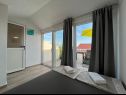 Appartamenti Niko - modern: SA1(2), A2(2+2), A3(2+2), A4(4+2) Kastel Luksic - Riviera Split  - Appartamento - A4(4+2): la camera da letto
