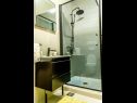 Appartamenti Tom - with hot tub: A1(6) Split - Riviera Split  - Appartamento - A1(6): il bagno con la toilette