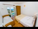 Appartamenti Bosiljka - by the sea: A1(5), A2(5), SA3(2) Sevid - Riviera Trogir  - Appartamento - A1(5): la camera da letto