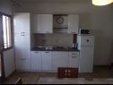 Appartamenti Mile - next to the sea A1(2+2), A2(2+2), A3(2+2) Kukljica - Isola di Ugljan  - Appartamento - A2(2+2): la cucina con la sala da pranzo