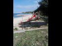 Appartamenti JoPek - sea view; SA1(2+1) Rtina - Riviera Zadar  - parco giochi per i bambini