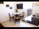 Appartamenti Almond A1(2+2), A2(4+2), A3(4+2) Vir - Riviera Zadar  - Appartamento - A2(4+2): la cucina con la sala da pranzo